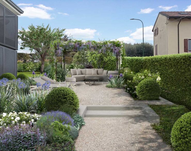 Giardino in pendenza a Verona progettato su più livelli con pergola verde e vasca idromassaggio